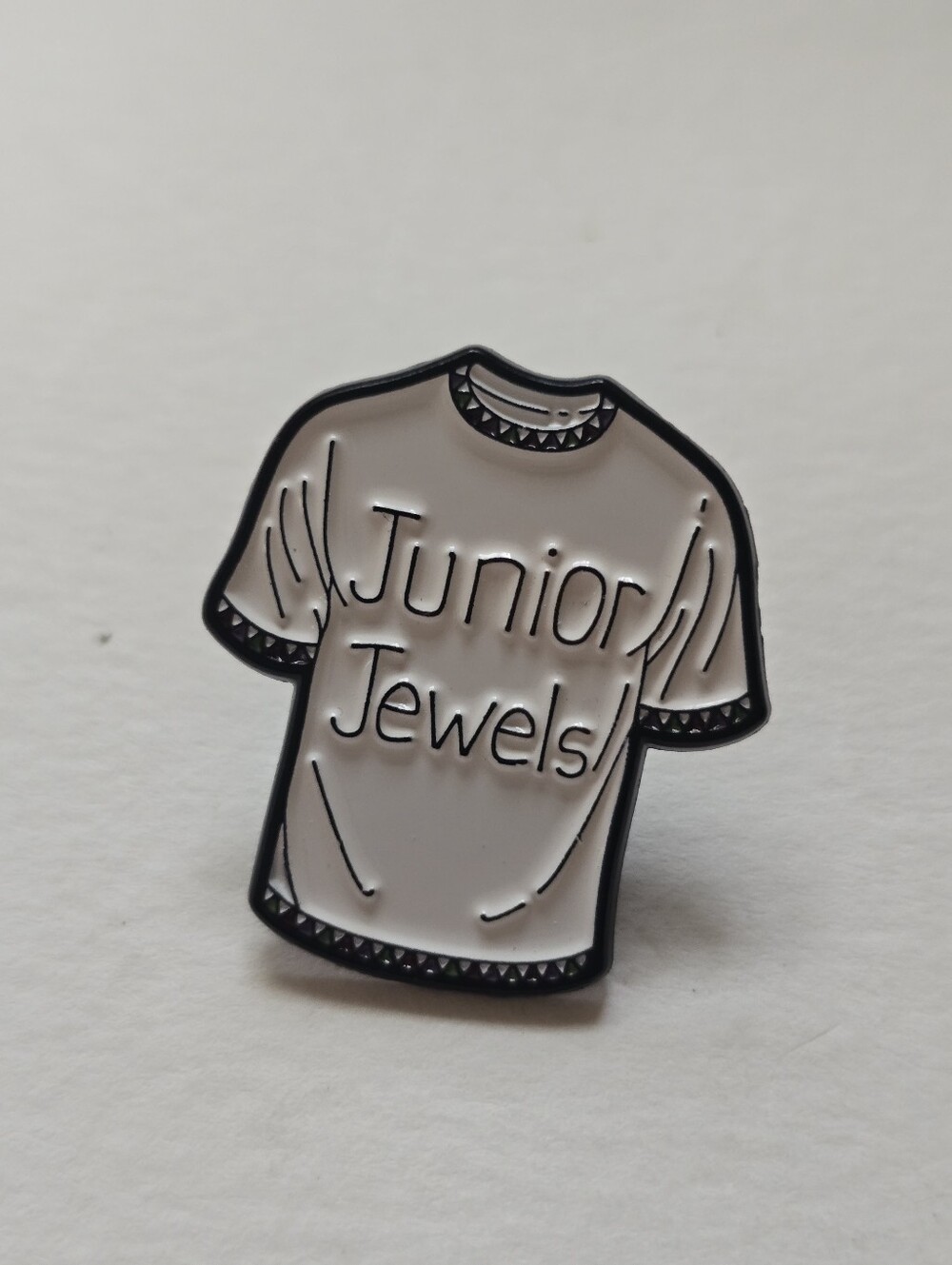Junior Jewels Taylor Swift White Enamel T-Shirt Pin